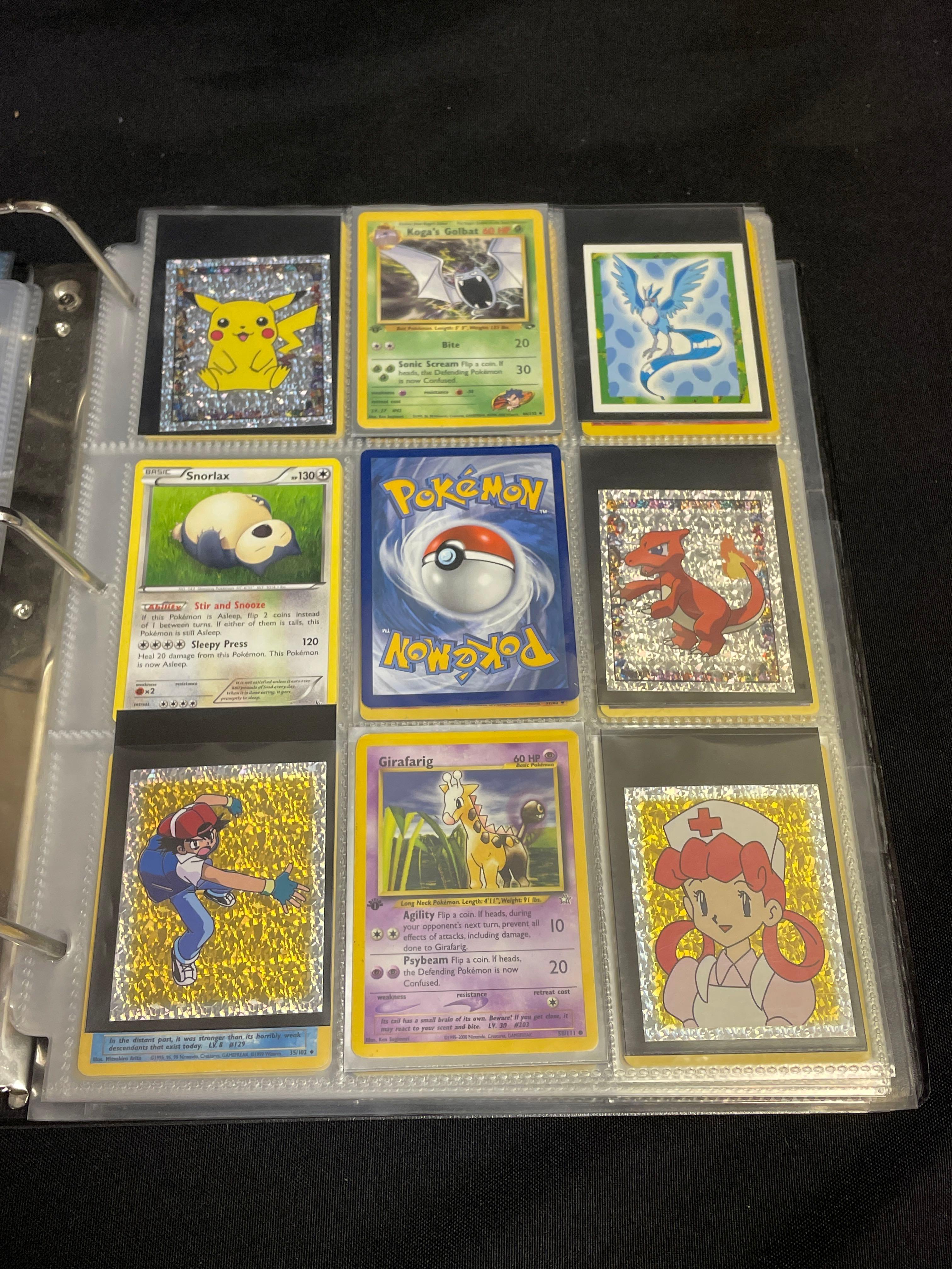 Pokemon album loaded with cards,refractors, and more