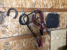 Wheelbarrow, jumper cords, horse shoe