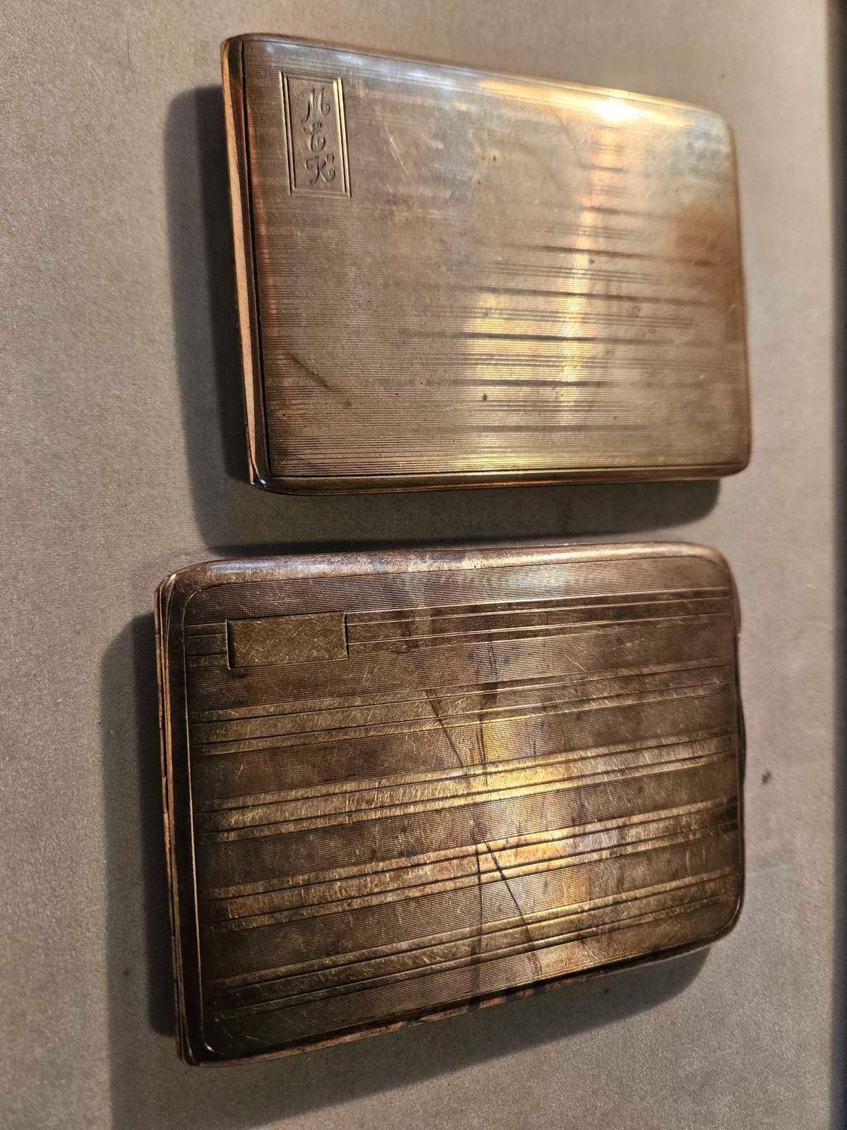 2 cigarette cases