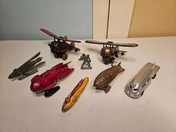 Assortment of Vintage Zeppelins and Wind Up Planes