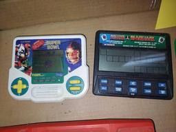 Assortment of Electronic Handheld Games