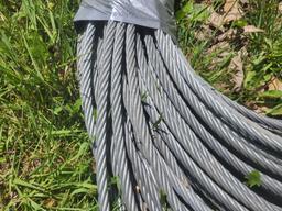 300+ ft of 3/8" zip line cable with anchor cables. Includes 5 Petzl cable trolleys with 4 carabiner