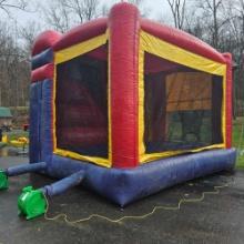 approx 15ft x 18ft bouncy house with slide and basketball hoop