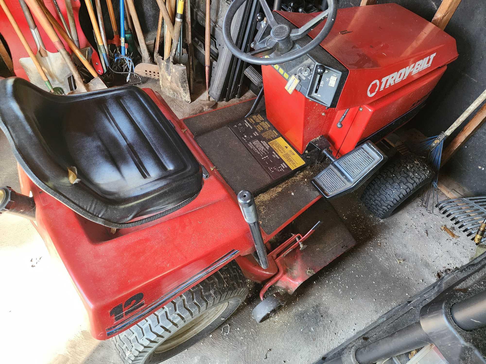 Troy-bilt tractor w/ manual & lawn thatcher attachment