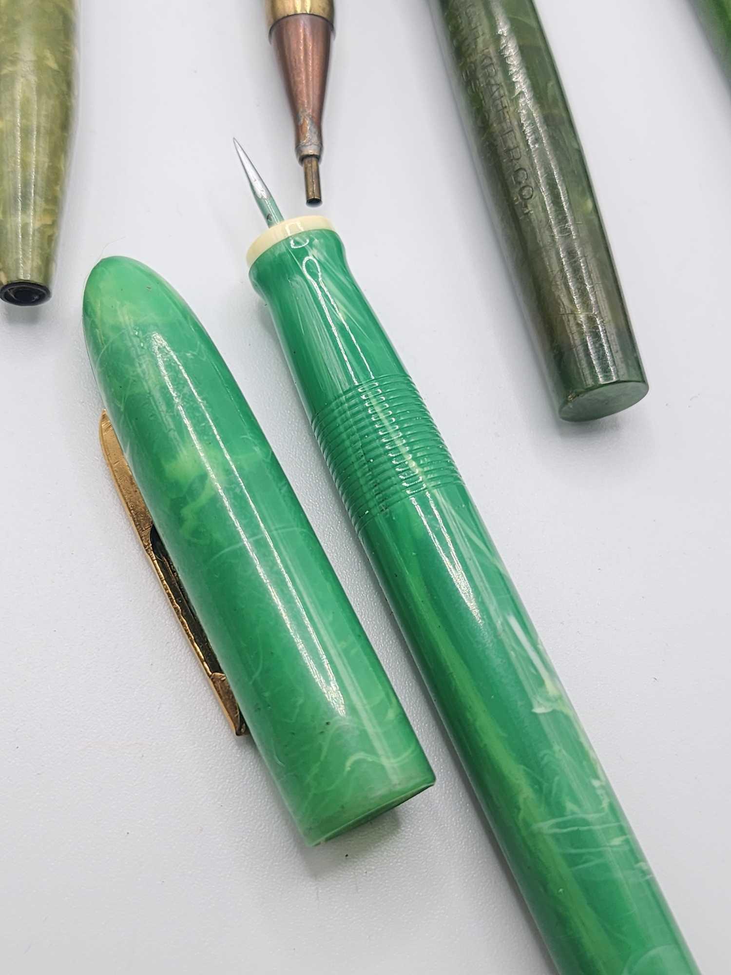 (12) vintage green plastic fountain pens & mechanical pencils