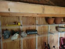 Contents of shed shelves, clay pots, metal fencing, rabbit and squirrel decor