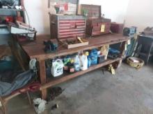 large workbench with vise