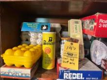 Shelf with golf items and CB radio