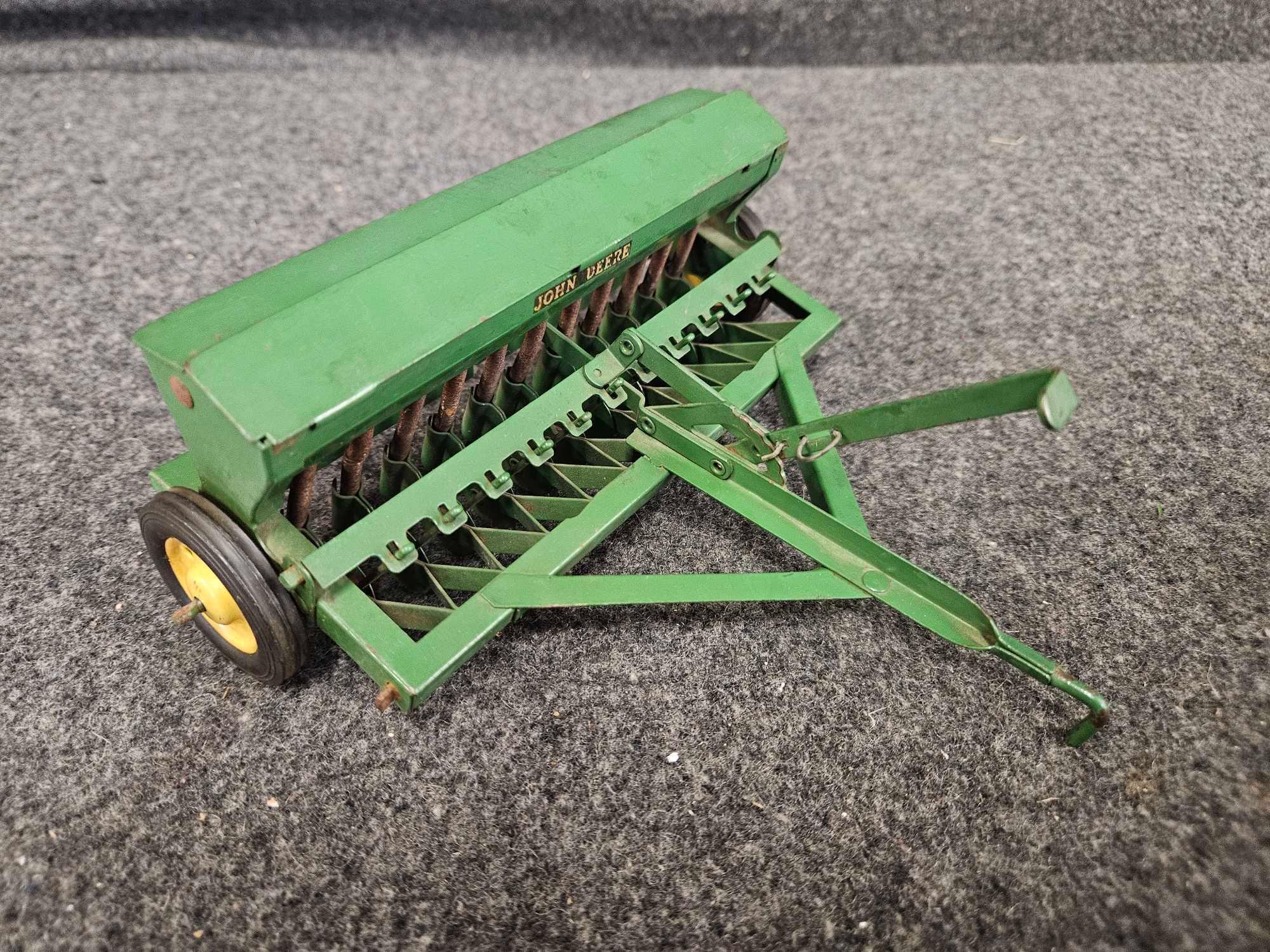Assortment of Vintage John Deere Implements - Plow, Spreader, Drill 1/16