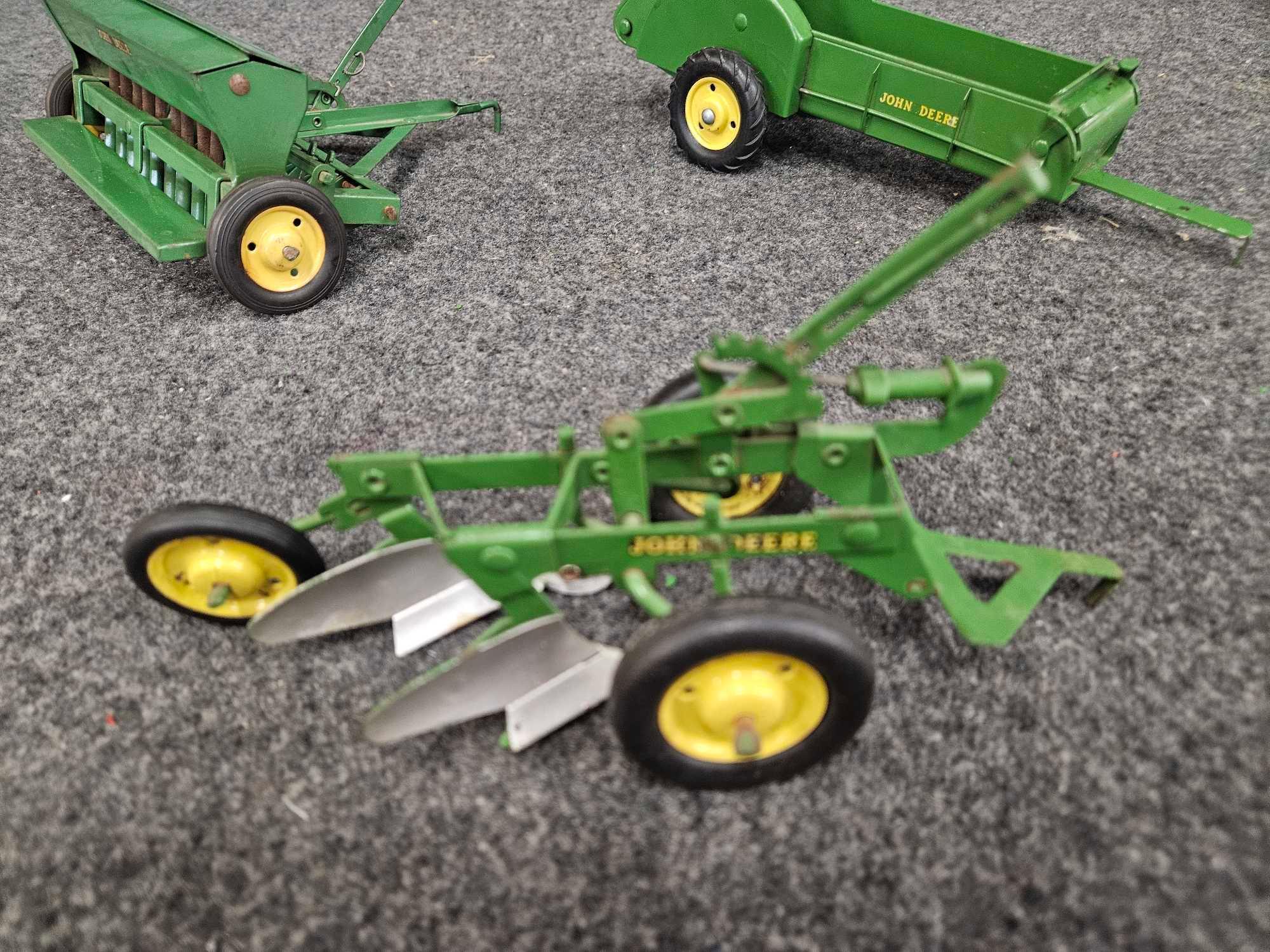 Assortment of Vintage John Deere Implements - Plow, Spreader, Drill 1/16