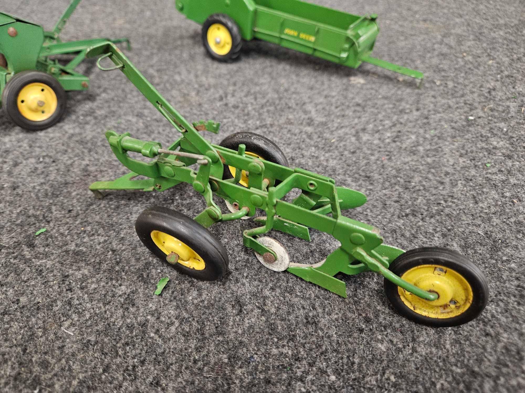 Assortment of Vintage John Deere Implements - Plow, Spreader, Drill 1/16