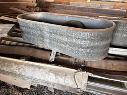 Two galvanized water troughs