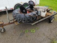 Utility trailer with tractor tire and misc tools