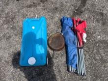 Cast iron skillet, camping chairs, camper tank transporter
