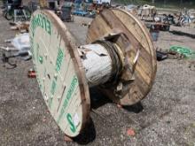 Wooden spool with some heavy wire