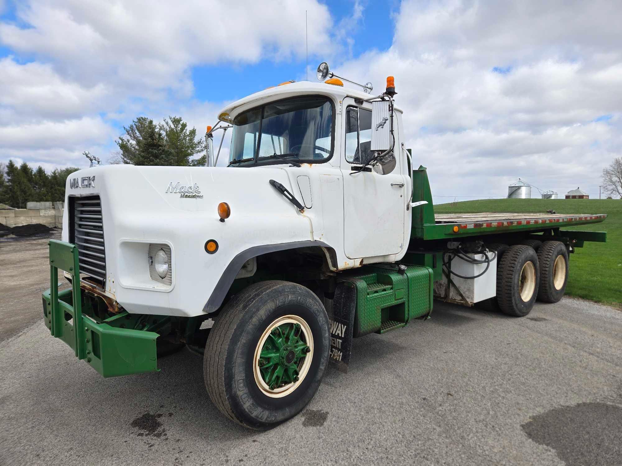 1995 Mack DM690S Roll Back Truck, runs and drives, 20 ft deck with winch