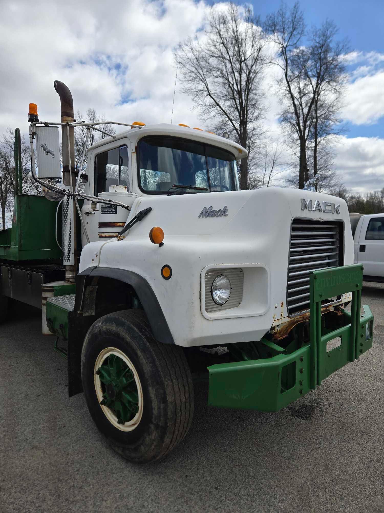 1995 Mack DM690S Roll Back Truck, runs and drives, 20 ft deck with winch