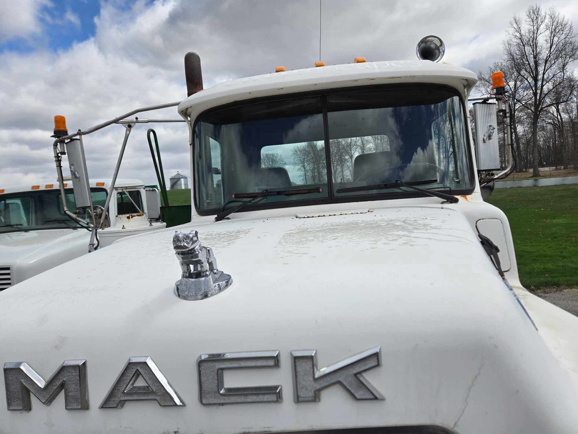 1995 Mack DM690S Roll Back Truck, runs and drives, 20 ft deck with winch