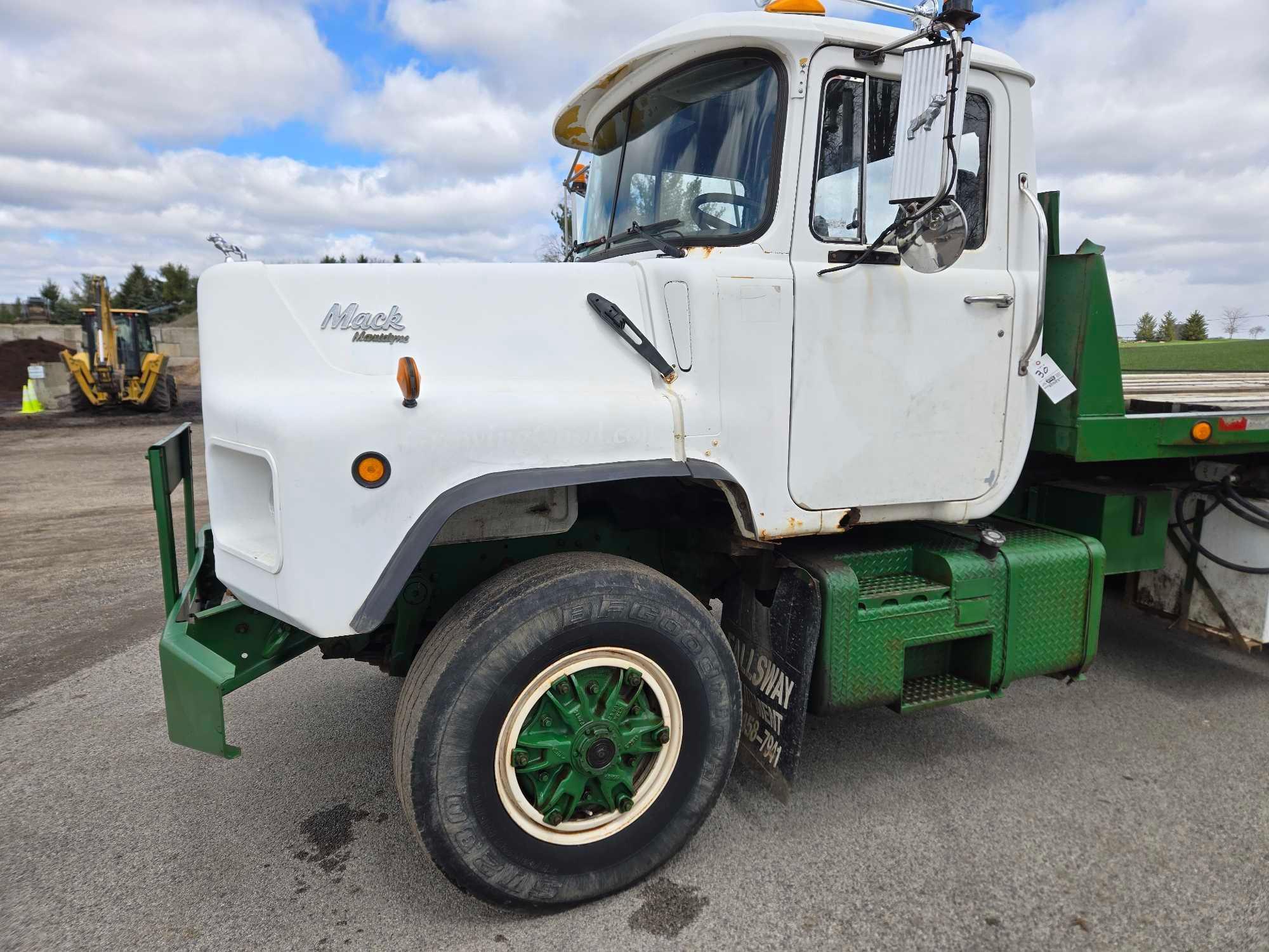 1995 Mack DM690S Roll Back Truck, runs and drives, 20 ft deck with winch