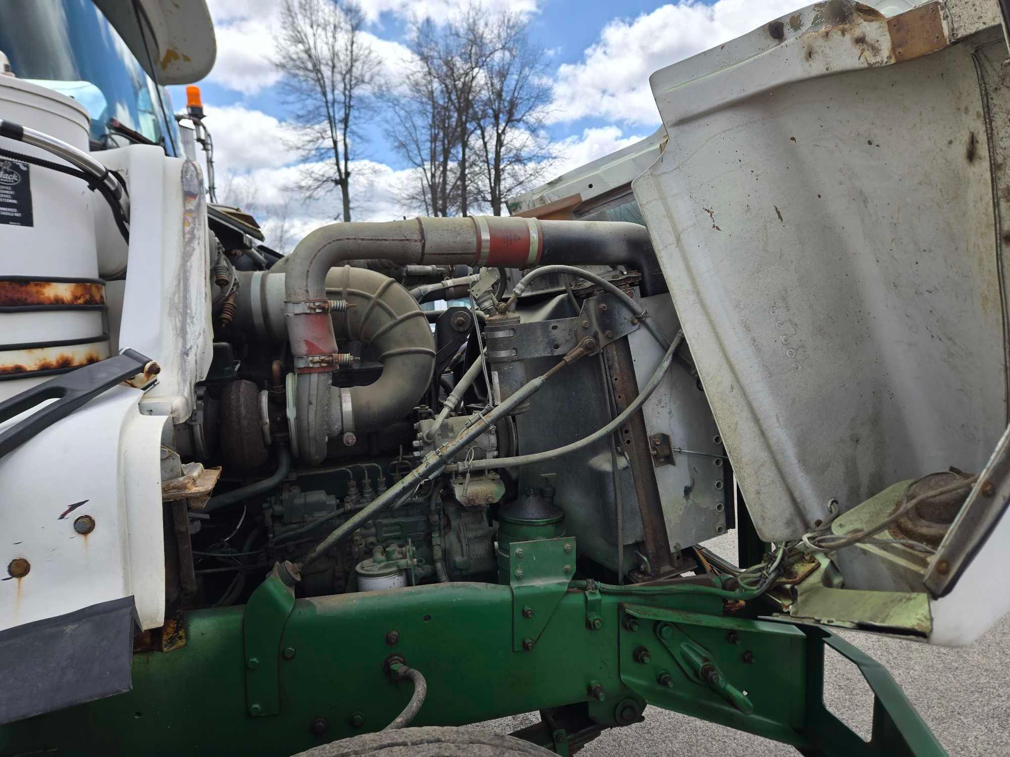 1995 Mack DM690S Roll Back Truck, runs and drives, 20 ft deck with winch