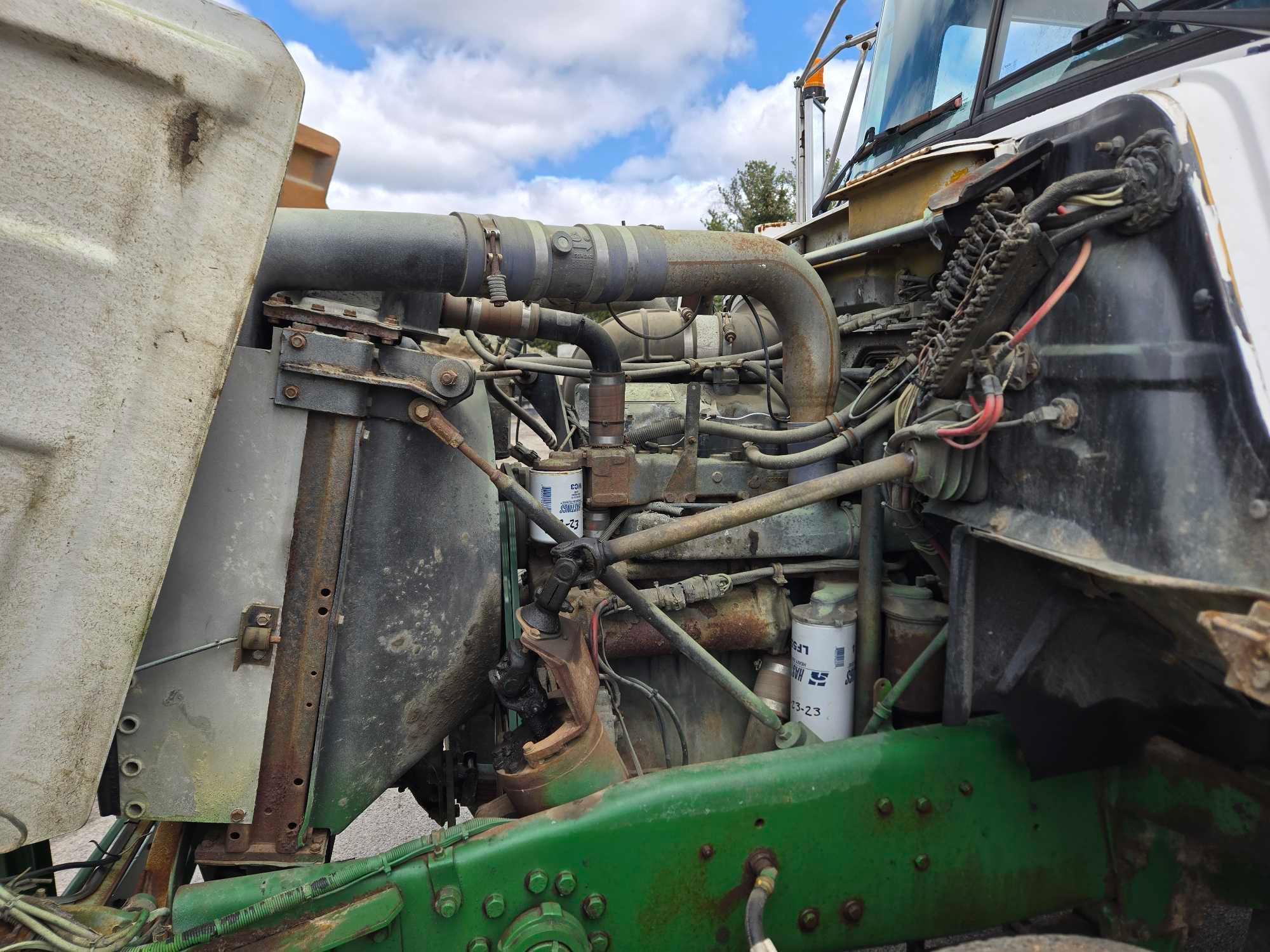 1995 Mack DM690S Roll Back Truck, runs and drives, 20 ft deck with winch