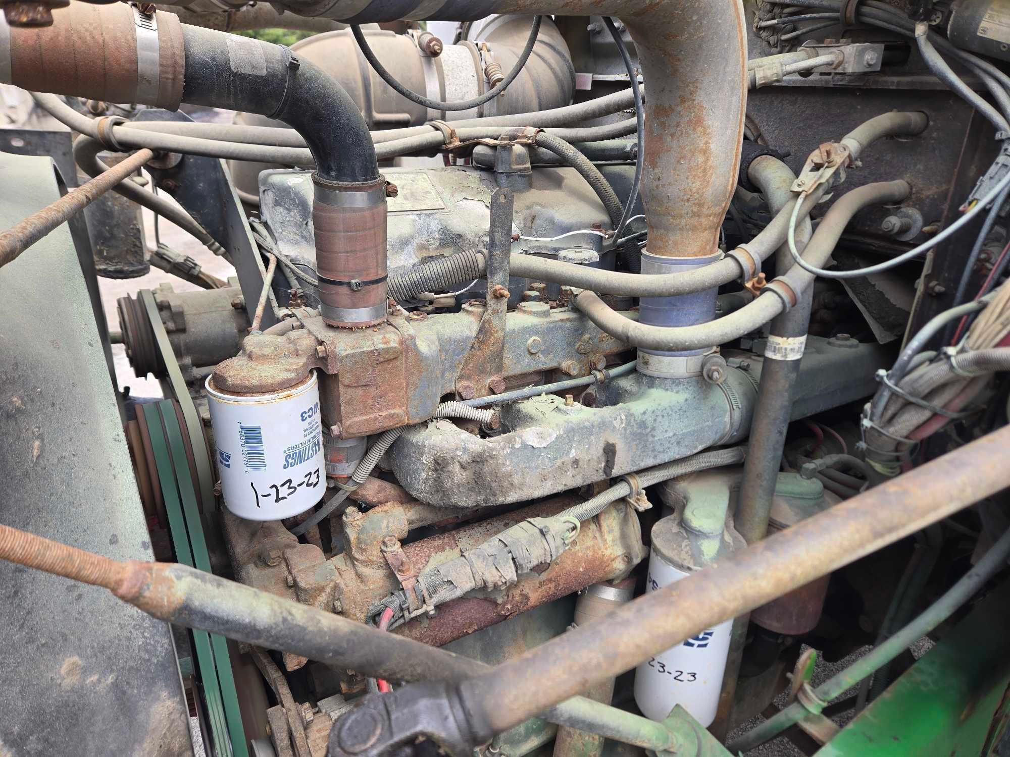 1995 Mack DM690S Roll Back Truck, runs and drives, 20 ft deck with winch