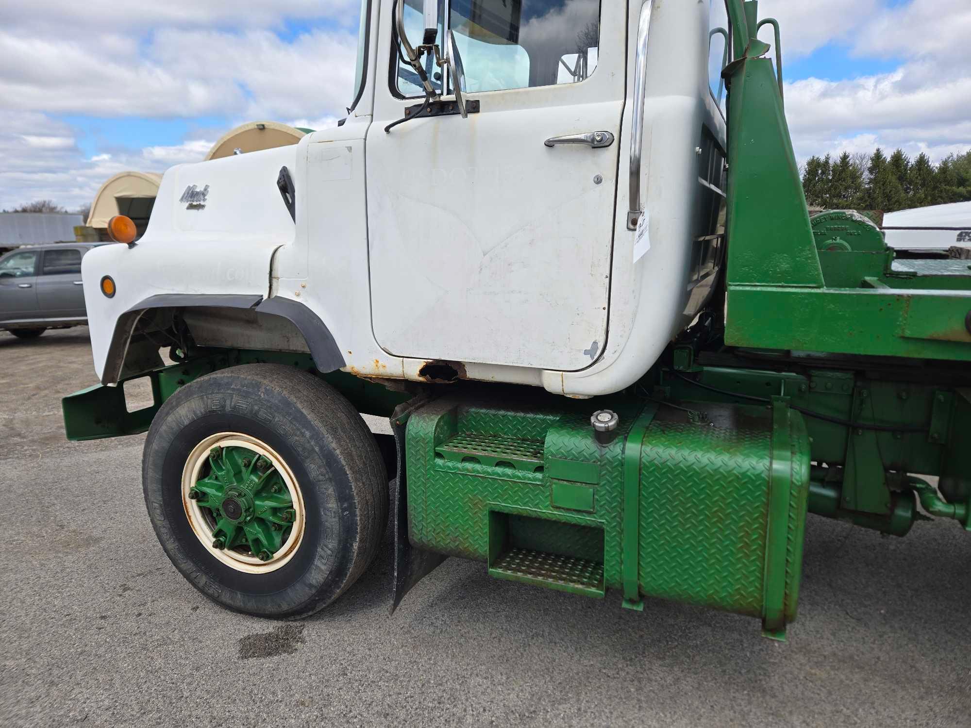 1995 Mack DM690S Roll Back Truck, runs and drives, 20 ft deck with winch