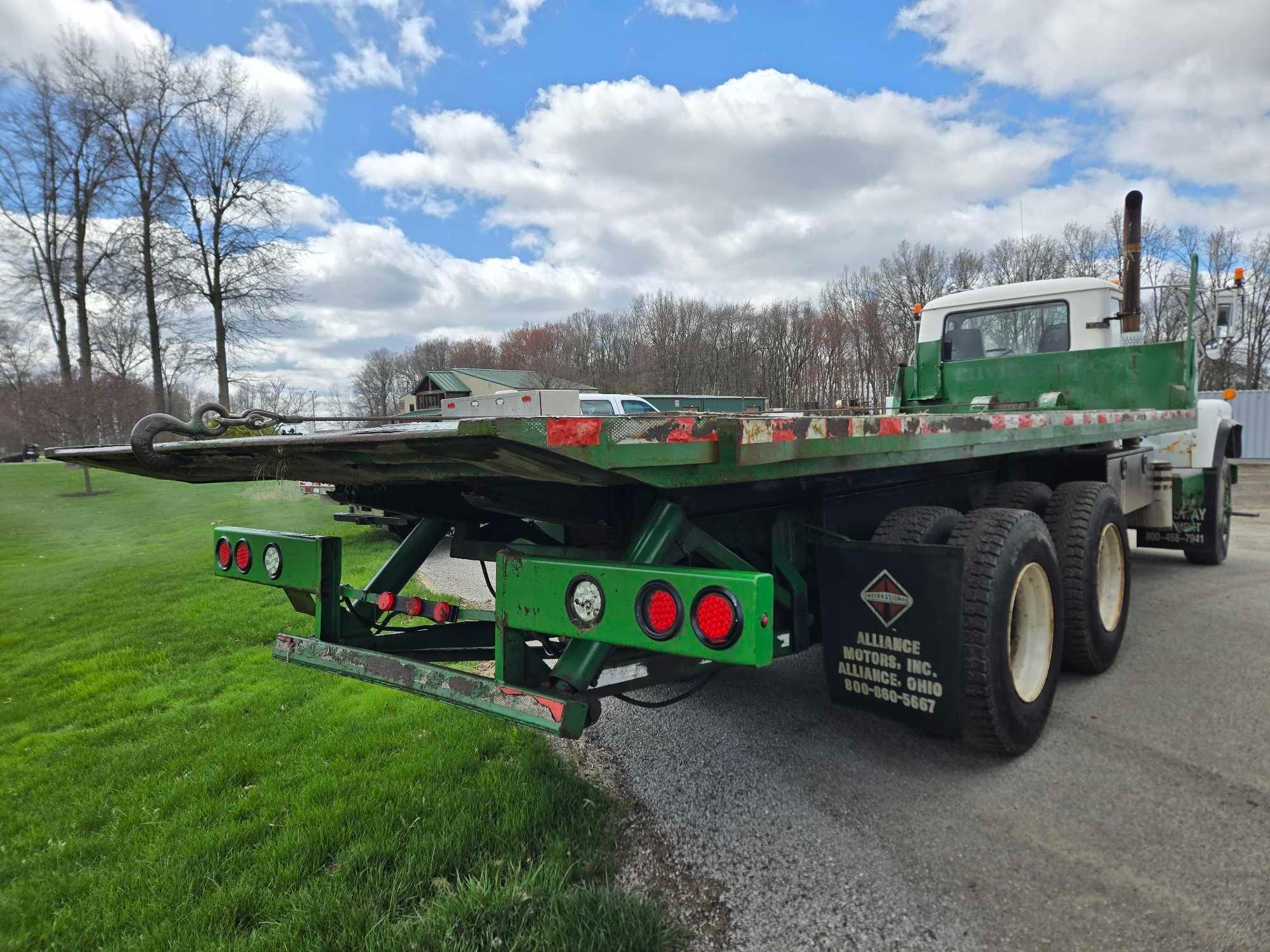 1995 Mack DM690S Roll Back Truck, runs and drives, 20 ft deck with winch