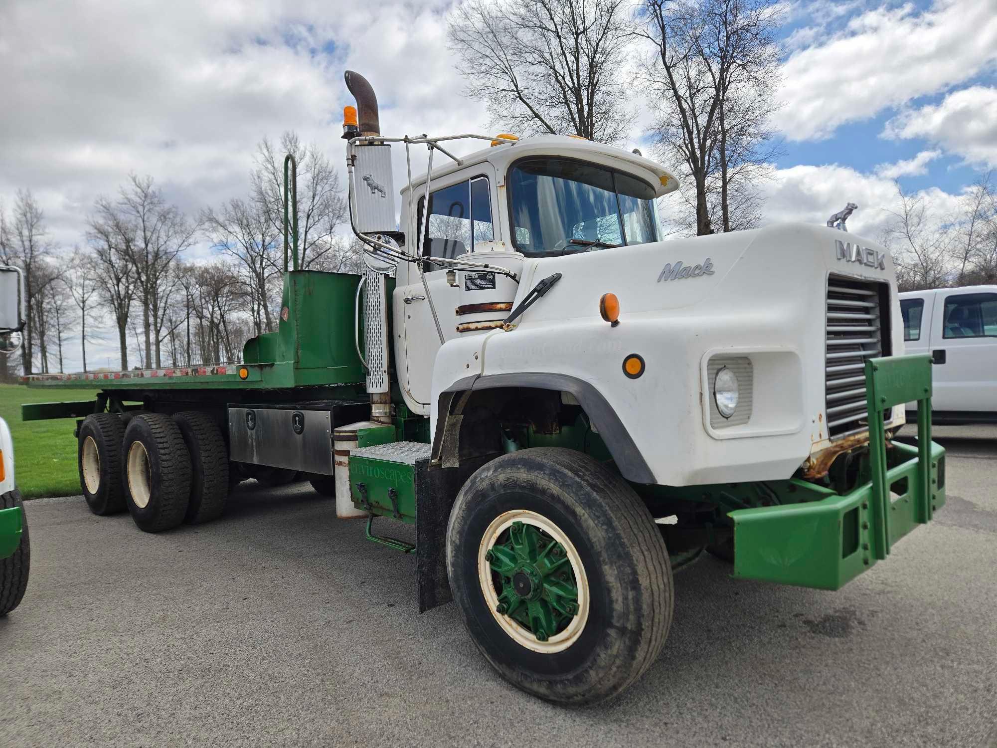 1995 Mack DM690S Roll Back Truck, runs and drives, 20 ft deck with winch