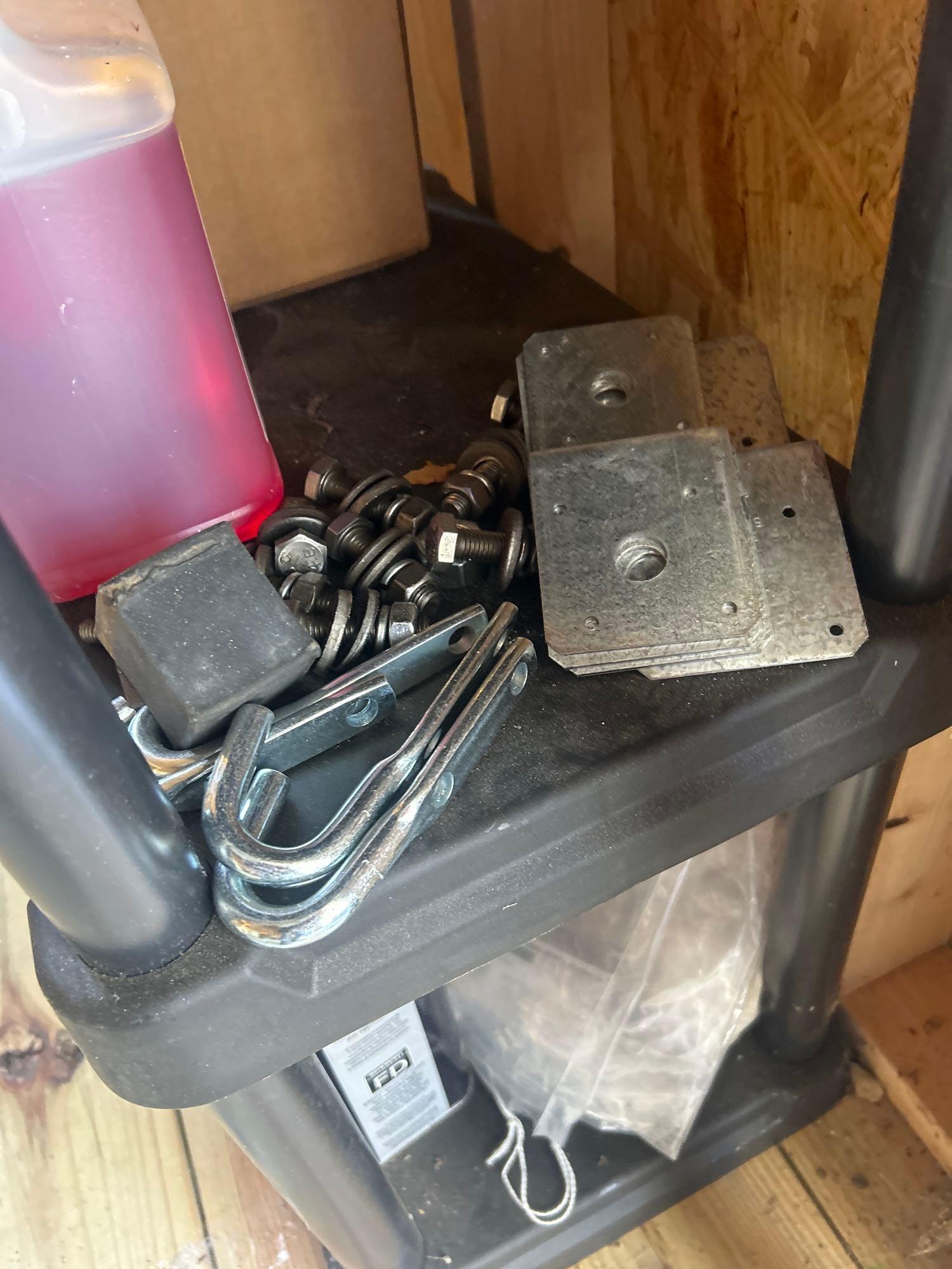 2 standing 4ft plastic storage shelves and contents