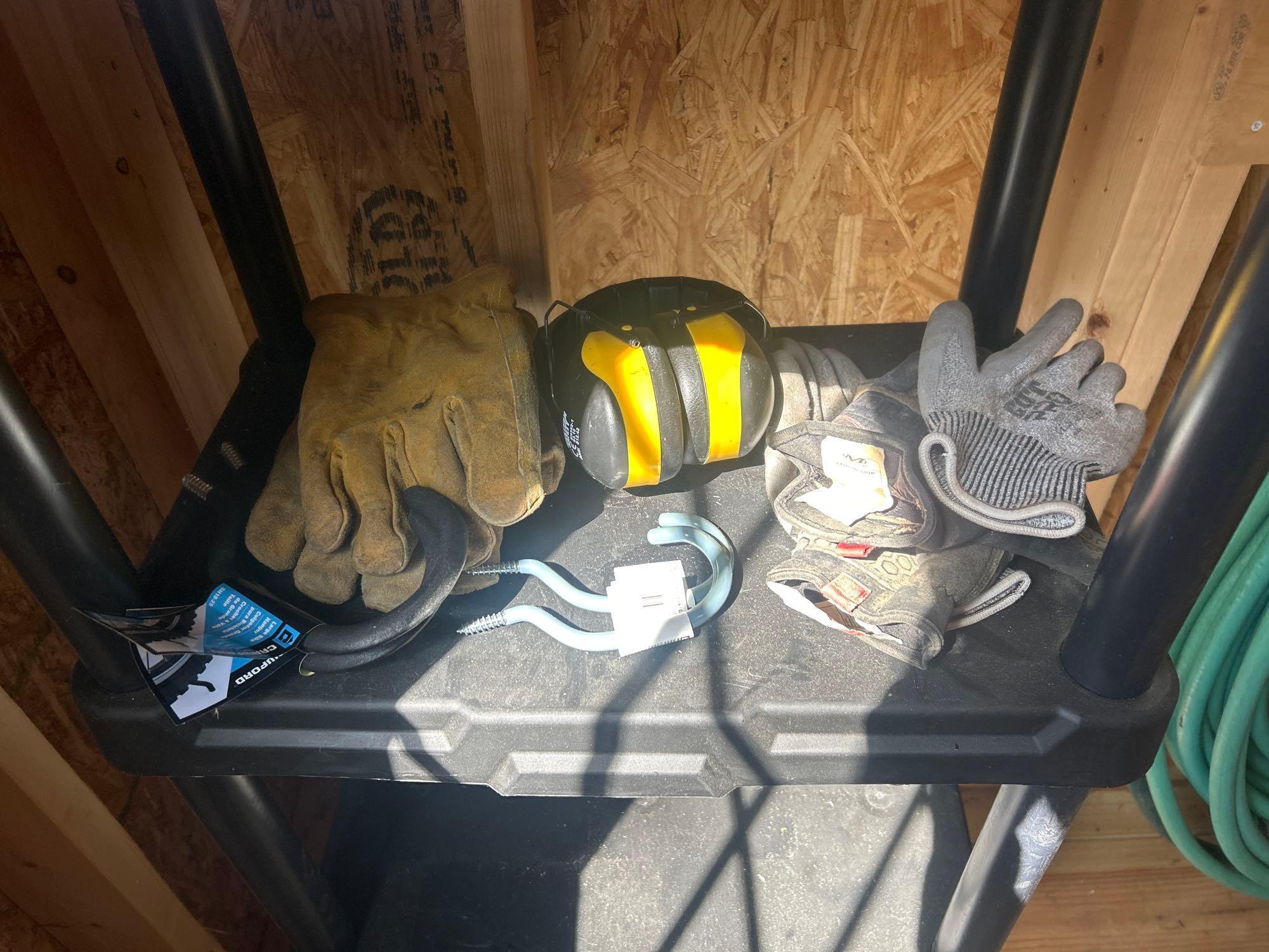 2 standing 4ft plastic storage shelves and contents