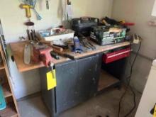 Work bench with a bench vice and contents