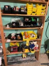Contents of the shelf - Hardware, caulking gun, dry wall tools, organizers