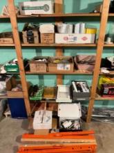 Contents of the shelf - sawhorses, hardware, household parts