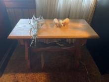 Small wooden bench with ceramic polar bears and decorative wall piece