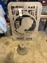 Pow-Mia sign and locomotive metal bell