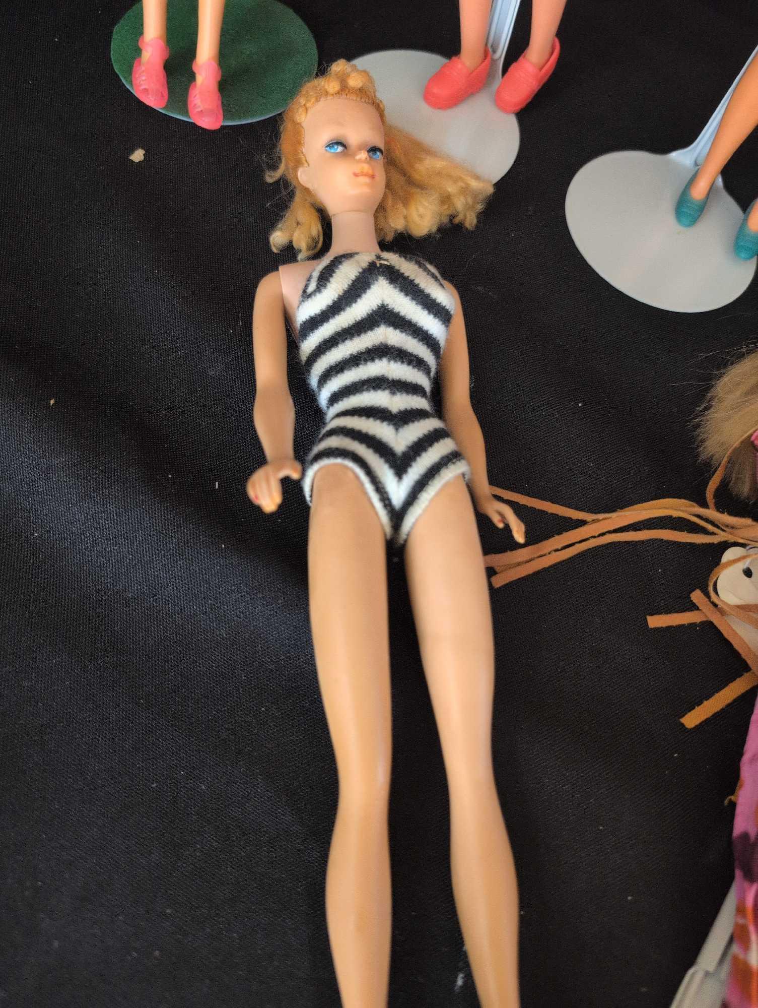 Group of vintage Mattel Barbies, live action, Skipper and more