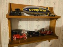 Goodyear Blimp, State Farm Fire Truck, Toy Cars