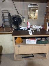 older drone (no remote), fan, dolly, shoeshine supplies