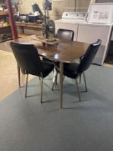 retro table and three chairs