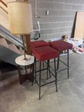 three vintage stools and lamp table