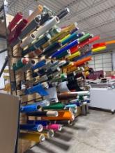 Large inventory of adhesive backed vinyl and shelf