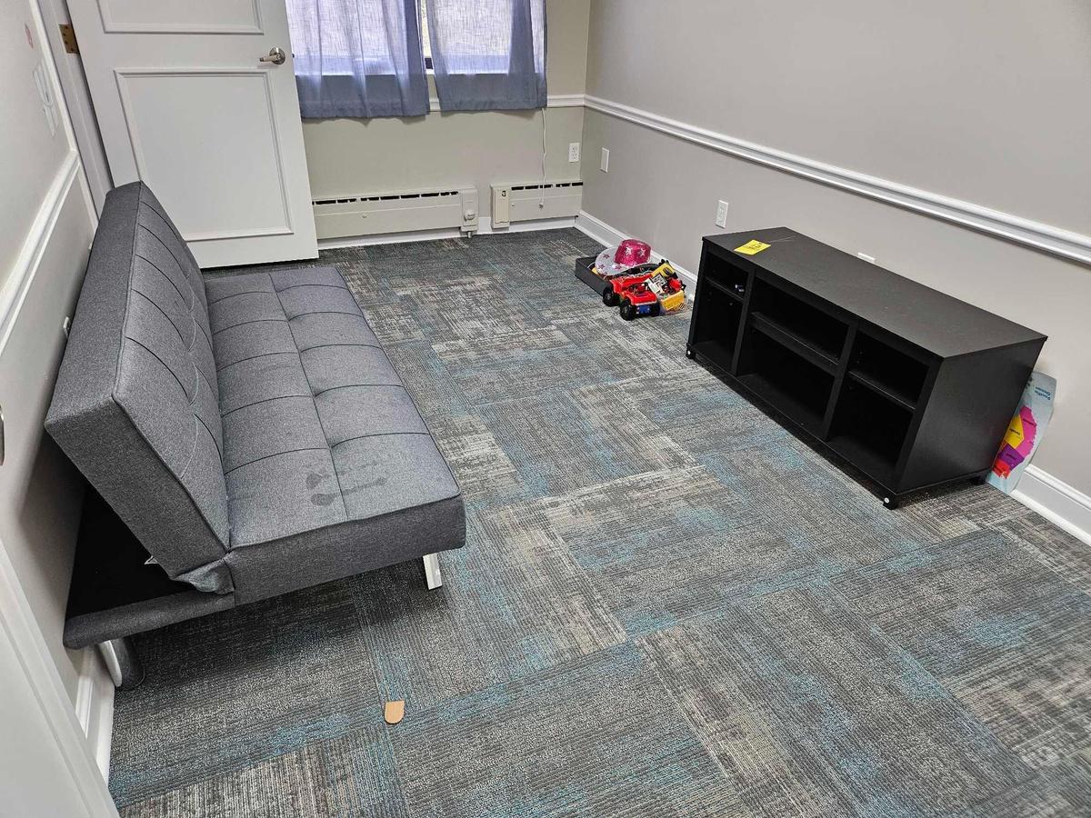 Contents of Kids Room - Adjustable Futon, Small TV Stand, & Toy Assortment