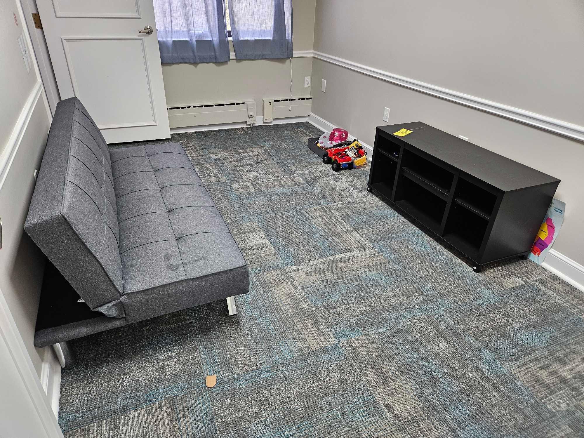 Contents of Kids Room - Adjustable Futon, Small TV Stand, & Toy Assortment