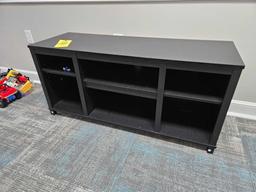 Contents of Kids Room - Adjustable Futon, Small TV Stand, & Toy Assortment