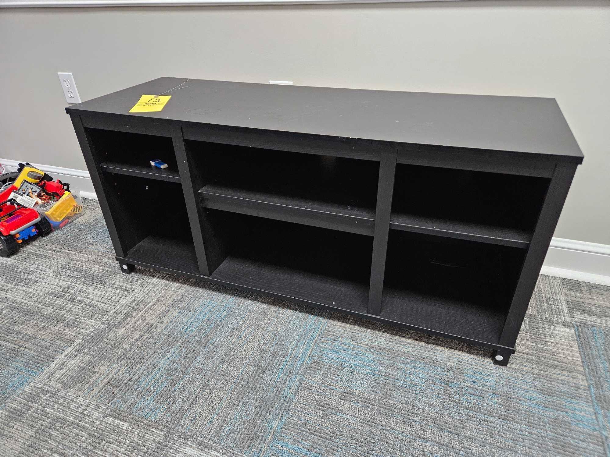 Contents of Kids Room - Adjustable Futon, Small TV Stand, & Toy Assortment
