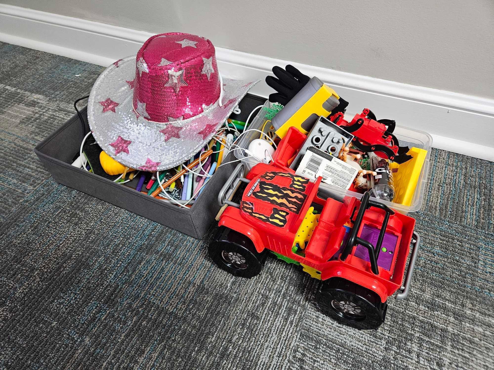 Contents of Kids Room - Adjustable Futon, Small TV Stand, & Toy Assortment