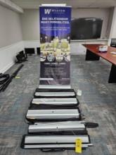 Assortment of Trade Show Banner Stands. 4 Black Tablecloths & Hat Assortment