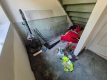 Contents Under Stairwell - Printer, Vacuum, Xmas Decor, Glass Panels, & Hardware