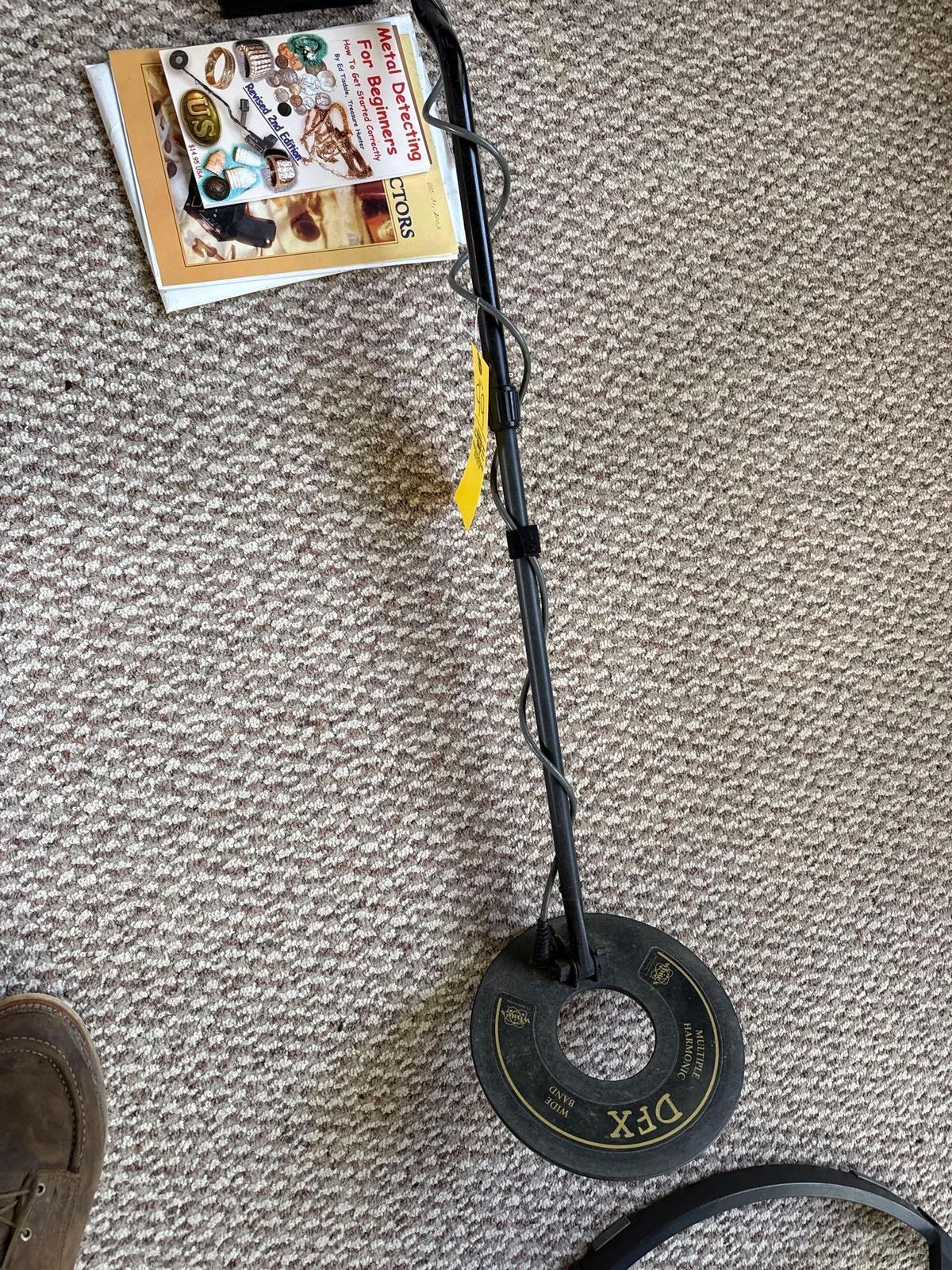 metal detector with books and misc supplies